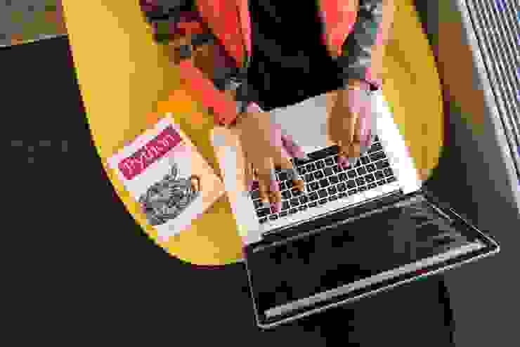 woman programming on a notebook