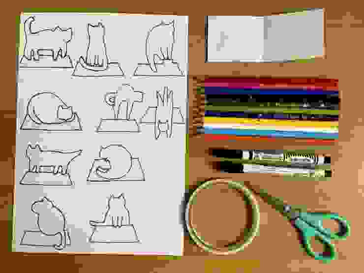 「貓房子書籤」所需材料，由左至右：自製貓咪線稿、一小張厚圖畫紙、色鉛筆、簽字筆、雙面膠和剪刀。