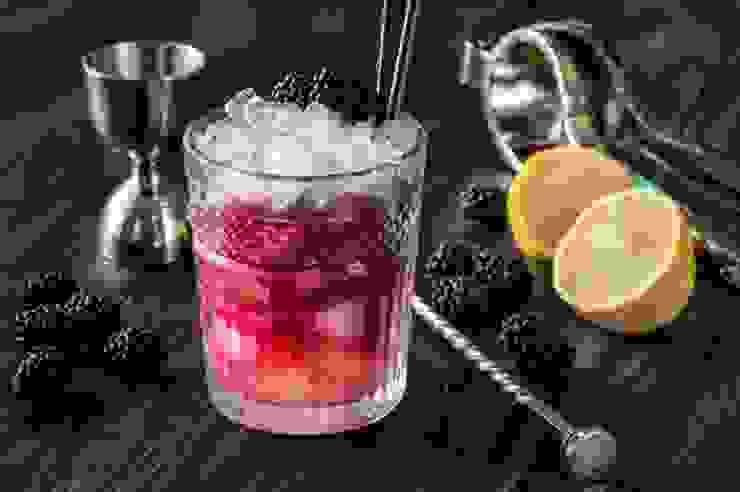 Bramble Cocktail made by Gin,Lemon juice,simple syrup,Cream de mure