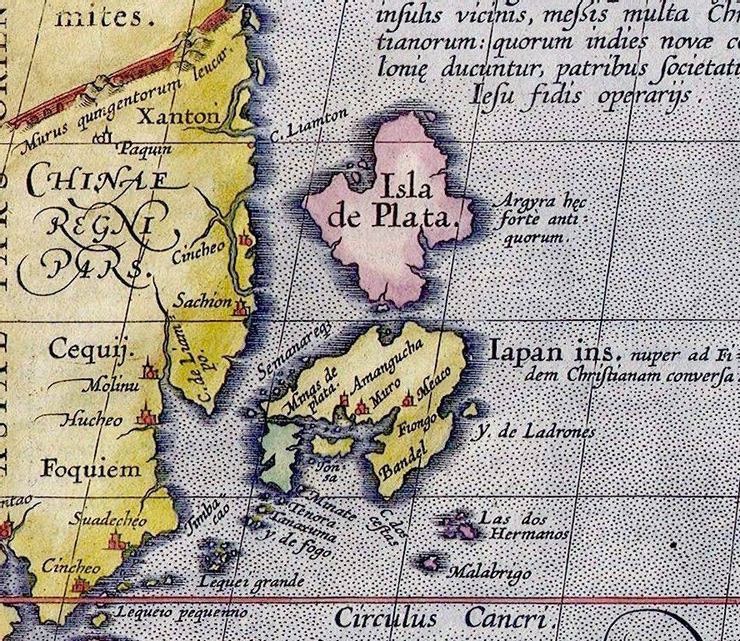 1589年 Ortelius 的太平洋地圖上,在日本的北方有 Isla de Plata(銀島)的紀載。小琉球(Lequeio pequeino,台灣)就在紅色的北回歸線上